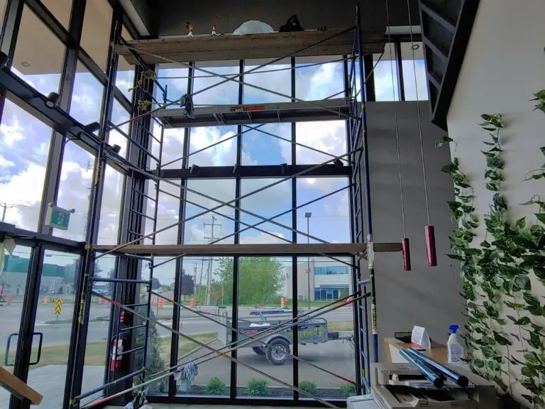 Low-E membrane installation on a commercial building