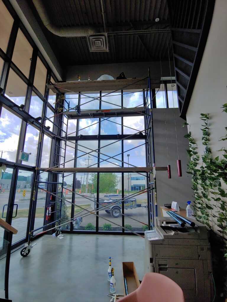 Low-E membrane installation on a commercial building