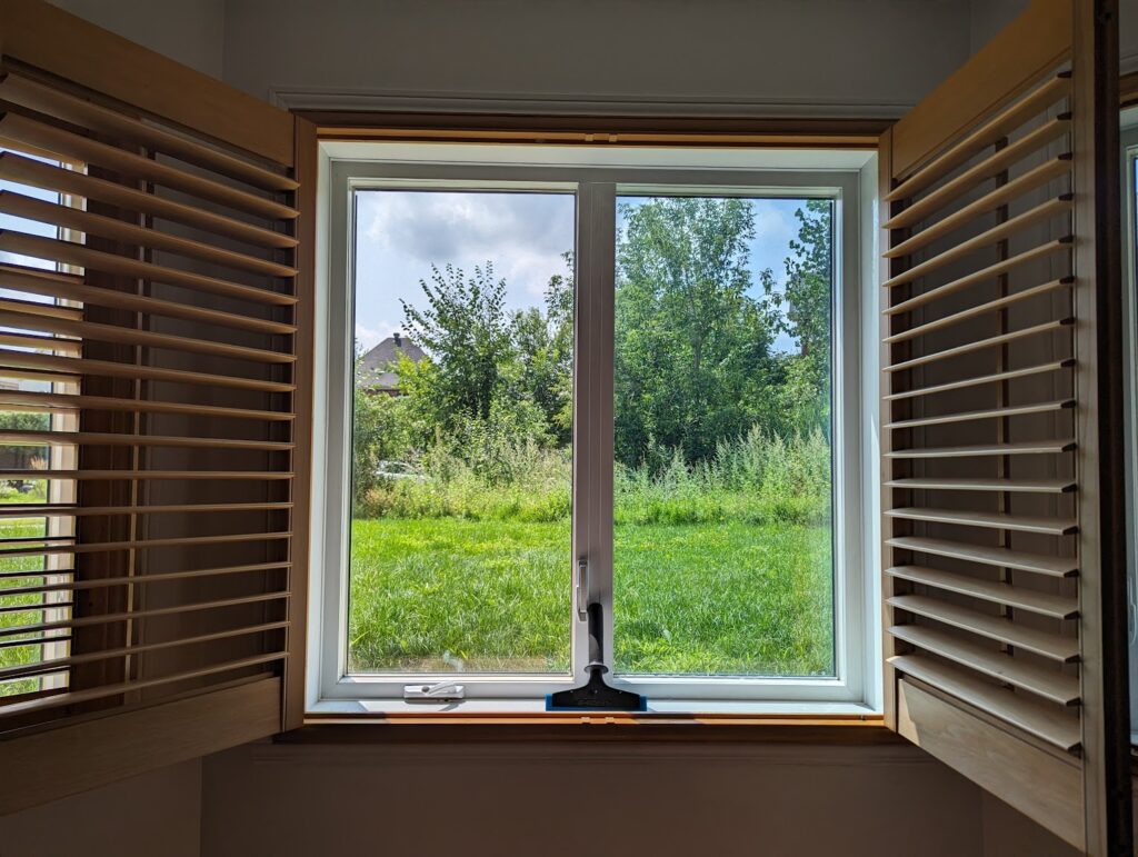Maison familiale avec fenêtres protégées membrane Low-E